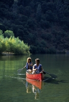 Canoeing Lake Clementine, Auburn, California Couple canoeing on Lake Clementine