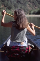 Canoeing Lake Clementine, California Woman canoeing on Lake Clementine, Auburn, California