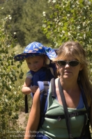 Hiking Sagehen Creek Trail, Truckee, California Woman hiking with her child on the Sagehen Creek Trail, Tahoe National Forest, California