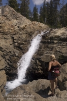 Hiker, Canyon Creek, California Hiker viewing a waterfall on Canyon Creek, Tahoe National Forest, California
