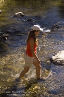 Hiker, Canyon Creek, California Hiker exploring a swimming hole on Canyon Creek, Tahoe National Forest, California