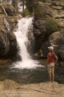 Hiker, Canyon Creek, California Hiker checking out a swimming hole on Canyon Creek, Tahoe National Forest, California
