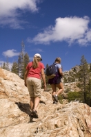 Hikers, Canyon Creek, California Women hiking a trail along Canyon Creek, Tahoe National Forest, California