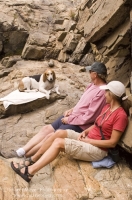 Hikers, Canyon Creek, California Hikers and dog taking a break from hiking along Canyon Creek, Tahoe National Forest, California