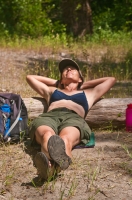 DH-0536 Hiker relaxing along the North Fork of the American River, Weimar, California.