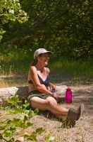 DH-0539 Hiker relaxing along the North Fork of the American River, Weimar, California.