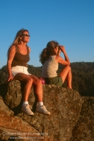 Iron Point, Alta, California Two woman enjoying the American River Canyon at sunset, from Iron Point, California