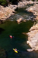 Kayaking the Yuba River, California Men Kayaking on the Middle Fork of the Yuba River, Nevada County, California