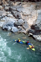 Kayaking the American River, California Kayakers eddying out at Yankee Jim's, on the north fork of the American River, near Colfax and Weimar, California