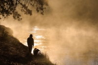 D-OL-03-02 Man and his dog enjoying the Deschutes River, La Pine State Park, Oregon
