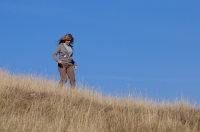 D-OL-03-15 Woman hiking at Cronan Ranch Regional Trails Park, Pilot Hill, California