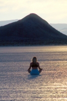 Black Rock Desert, Nevada Woman meditating on the playa, in the Black Rock Desert, Nevada