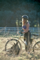 Mountain Biking in Coloma, California  Woman and her dog take a break from Mountain Biking, Coloma, California