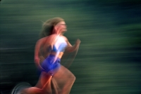 Pan of a woman running in Rural Auburn, California Pan of a woman running, Auburn, California