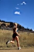 Trail running in Palmer Lake, Colorado Woman trail running in Palmer Lake, Colorado