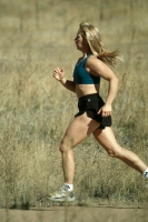 Woman trail running in Palmer Lake, Colorado Woman trail running in Palmer Lake, Colorado