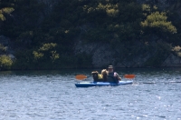 Man and dog kayaking Lake Faucherie, California Man and his dog kayaking Lake Faucherie