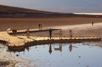 DT-CA-09-18 Tourists exploring Badwater Basin, Death Valley National Park, California
