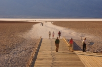 DT-CA-10-01 Tourists exploring Badwater Basin, Death Valley National Park, California