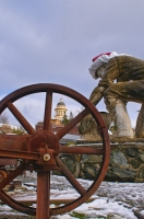 DT-CA-2133 Statue of gold miner Claude Chana in the snow, with the historic Auburn Courthouse in the background, Auburn, California.