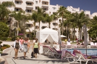 Cabo San Lucas, Mexico Tourists at the pool, Pueblo Bonito Rose' Resort, Cabo San Lucas, Baja California, Mexico