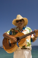 Cabo San Lucas, Mexico Beach musician on the beach (playa), Cabo San Lucas, Baja California, Mexico 