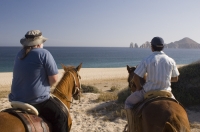 Cabo San Lucas, Mexico Horseback riding on El Medano Beach (playa), Cabo San Lucas, Baja California, Mexico