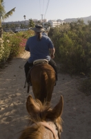 Cabo San Lucas, Mexico Tourists horseback riding in Cabo San Lucas, Baja California, Mexico