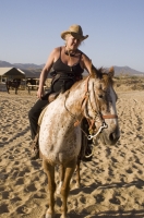 Cabo San Lucas, Mexico Tourist horseback riding in Cabo San Lucas, Baja California, Mexico